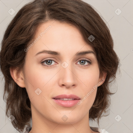 Joyful white young-adult female with medium  brown hair and green eyes