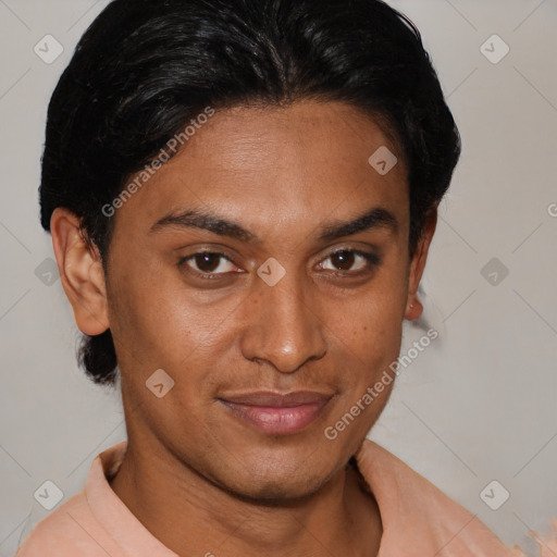 Joyful latino young-adult male with short  black hair and brown eyes