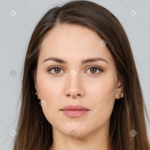 Neutral white young-adult female with long  brown hair and brown eyes