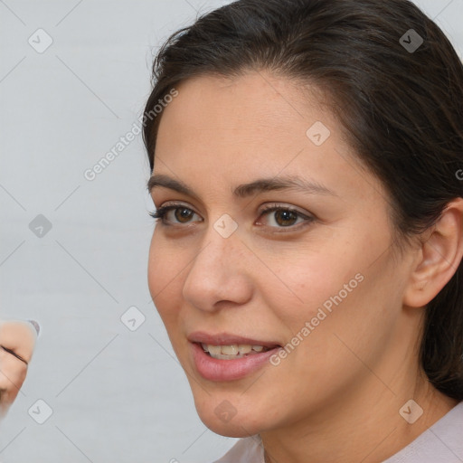 Joyful white young-adult female with medium  brown hair and brown eyes