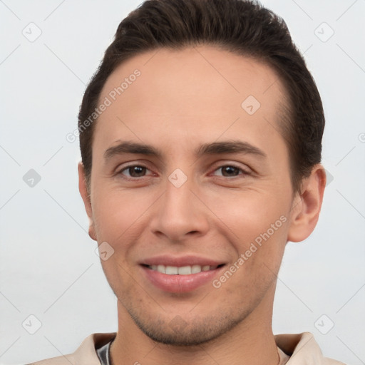 Joyful white young-adult male with short  brown hair and brown eyes