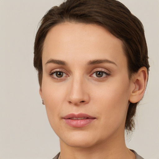 Neutral white young-adult female with short  brown hair and brown eyes