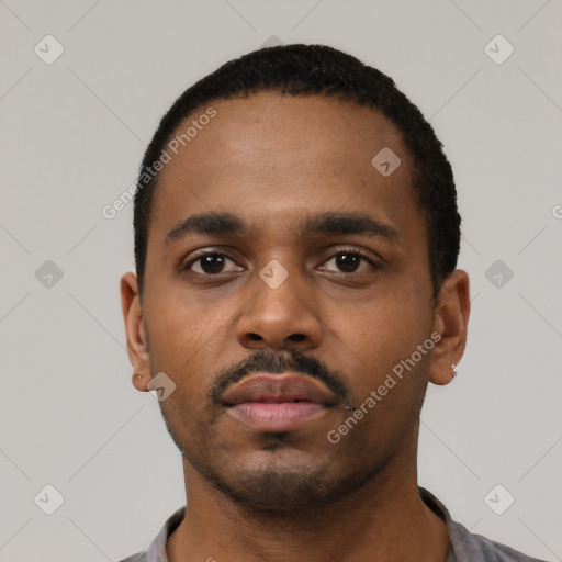 Neutral black young-adult male with short  black hair and brown eyes