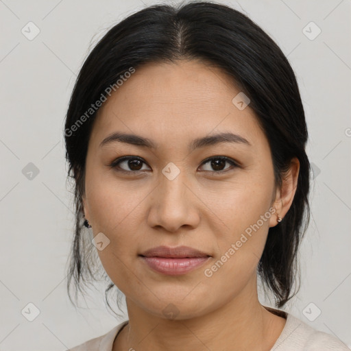 Joyful asian young-adult female with medium  black hair and brown eyes