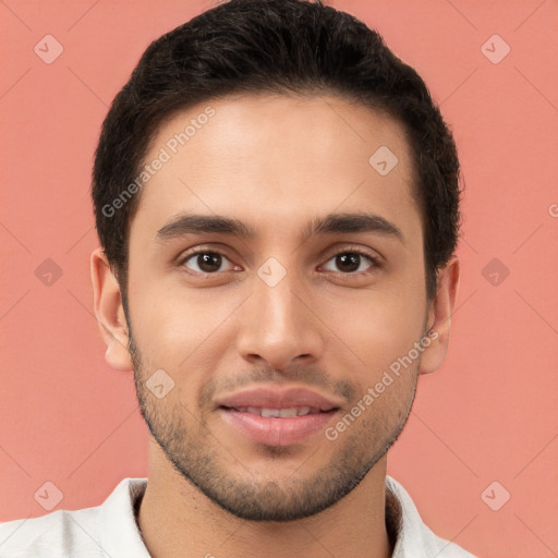 Joyful white young-adult male with short  brown hair and brown eyes