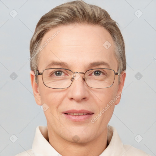 Joyful white adult female with short  brown hair and grey eyes