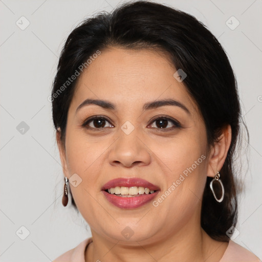 Joyful latino young-adult female with medium  brown hair and brown eyes