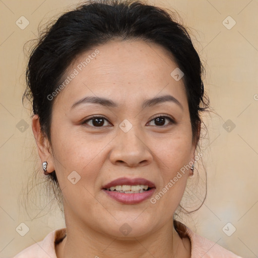 Joyful white adult female with medium  brown hair and brown eyes