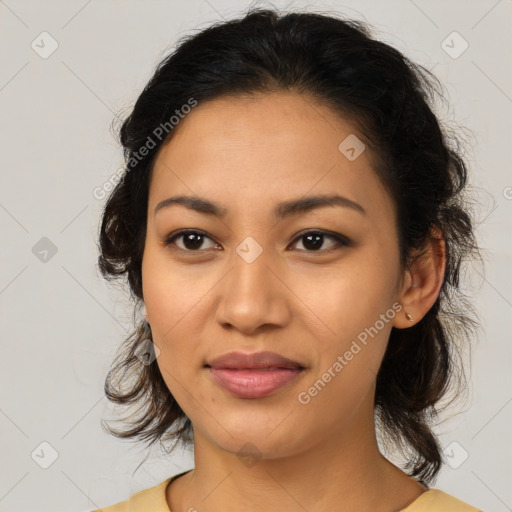 Joyful latino young-adult female with medium  brown hair and brown eyes