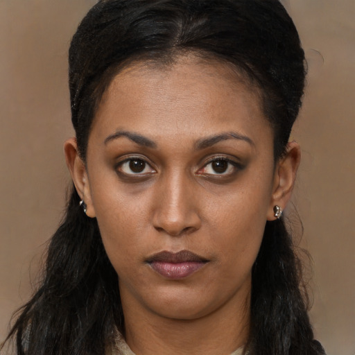 Neutral latino young-adult female with long  brown hair and brown eyes