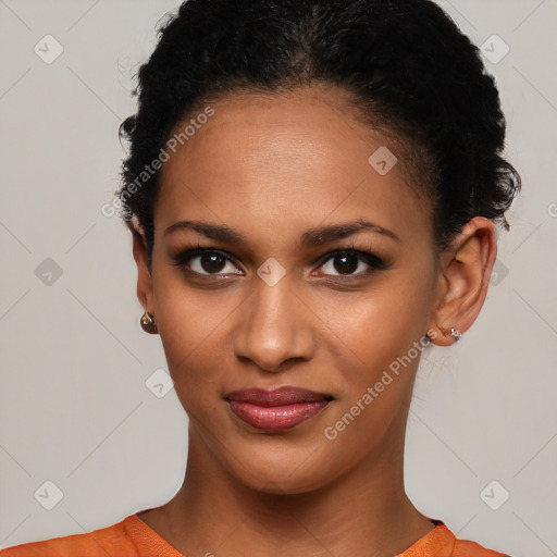 Joyful latino young-adult female with short  brown hair and brown eyes