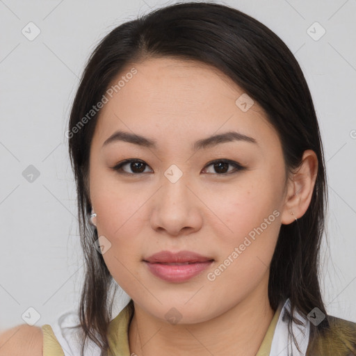 Joyful asian young-adult female with medium  brown hair and brown eyes