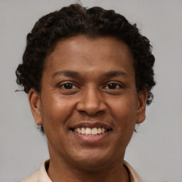 Joyful latino adult female with short  brown hair and brown eyes