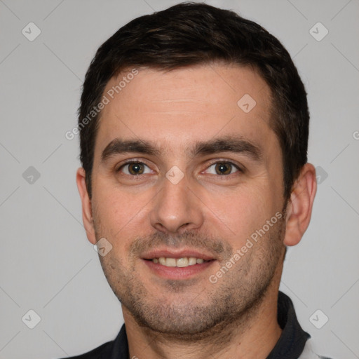 Joyful white young-adult male with short  brown hair and brown eyes