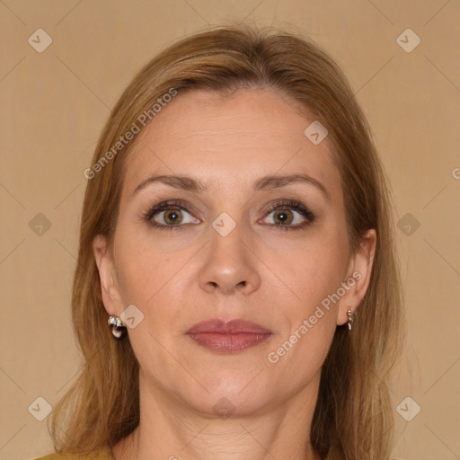 Joyful white adult female with medium  brown hair and brown eyes