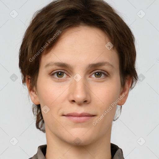 Joyful white young-adult female with short  brown hair and grey eyes