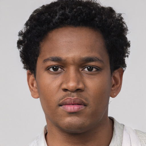 Neutral black young-adult male with short  brown hair and brown eyes