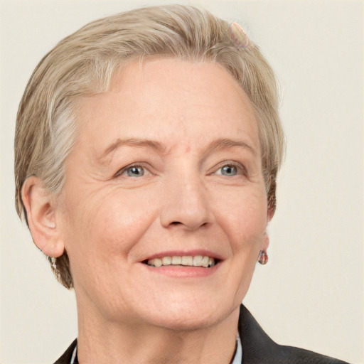 Joyful white middle-aged female with short  brown hair and grey eyes