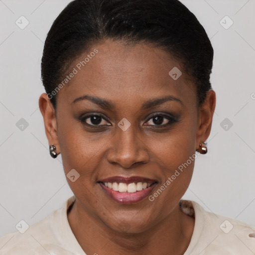 Joyful black young-adult female with short  brown hair and brown eyes