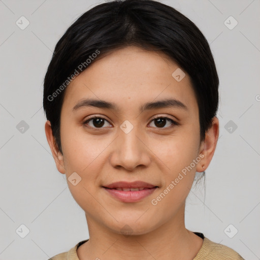 Joyful latino young-adult female with short  black hair and brown eyes