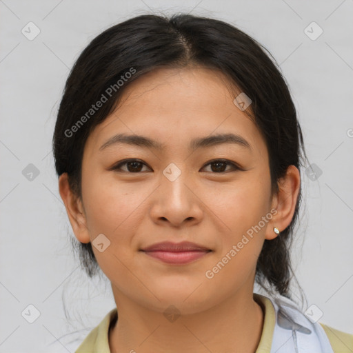 Joyful asian young-adult female with medium  brown hair and brown eyes