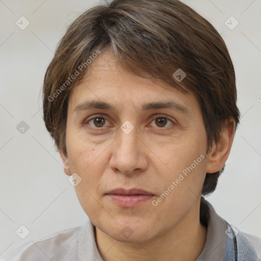 Joyful white adult female with short  brown hair and brown eyes