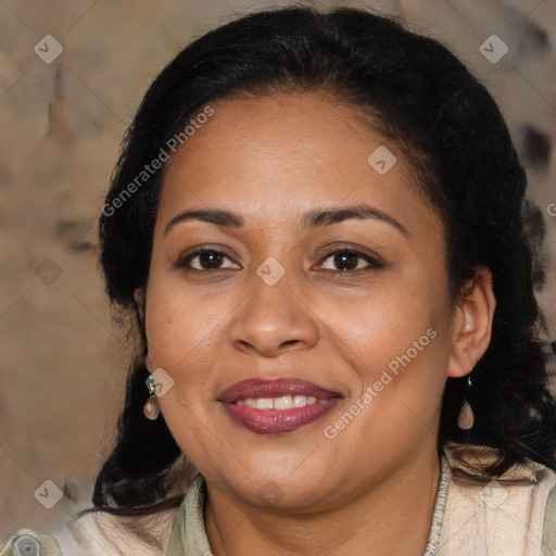 Joyful latino adult female with medium  brown hair and brown eyes