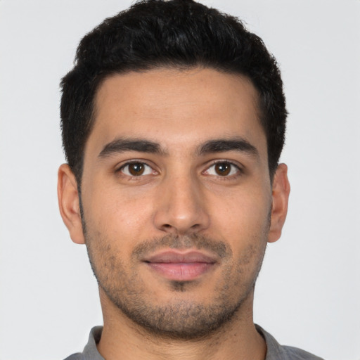 Neutral latino young-adult male with short  brown hair and brown eyes