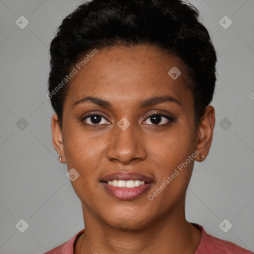 Joyful black young-adult female with short  brown hair and brown eyes