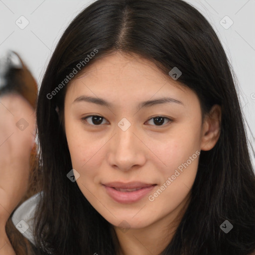 Joyful asian young-adult female with long  brown hair and brown eyes