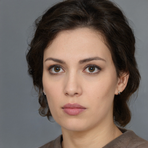 Neutral white young-adult female with medium  brown hair and brown eyes