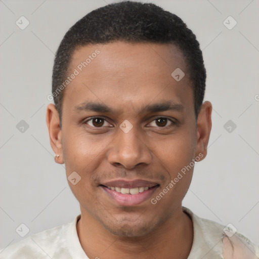 Joyful black young-adult male with short  black hair and brown eyes