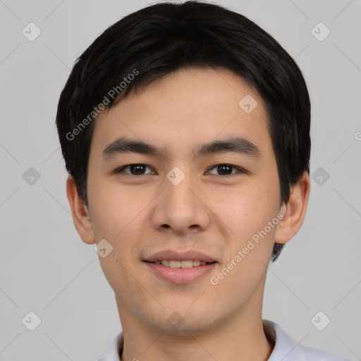 Joyful asian young-adult male with short  black hair and brown eyes