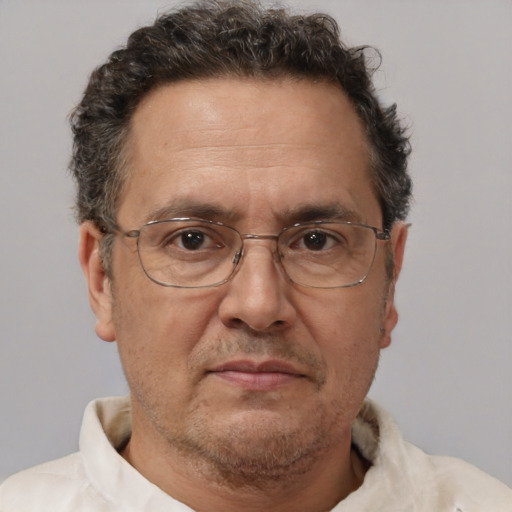 Neutral white middle-aged male with short  brown hair and brown eyes