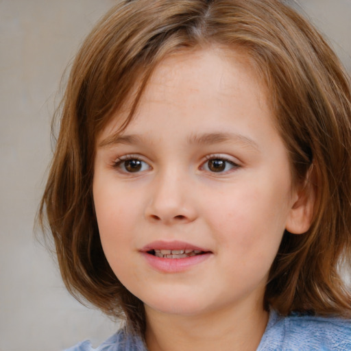 Joyful white child female with medium  brown hair and brown eyes