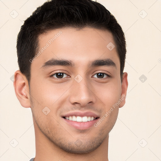 Joyful white young-adult male with short  brown hair and brown eyes