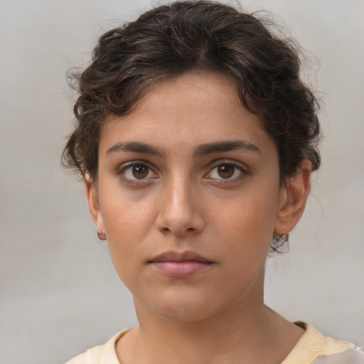 Neutral white young-adult female with short  brown hair and brown eyes