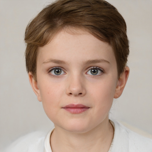 Joyful white child female with short  brown hair and grey eyes