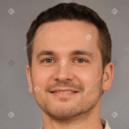 Joyful white young-adult male with short  brown hair and brown eyes