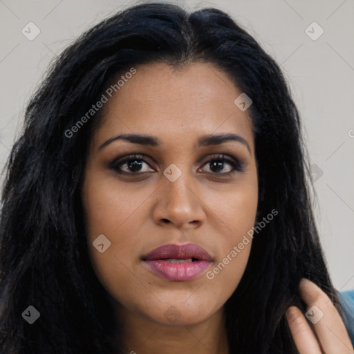 Joyful latino young-adult female with long  brown hair and brown eyes