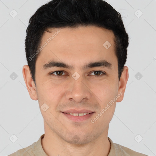 Joyful asian young-adult male with short  brown hair and brown eyes