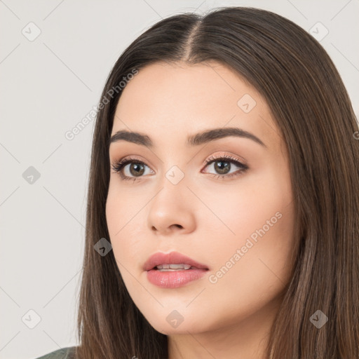 Neutral white young-adult female with long  brown hair and brown eyes