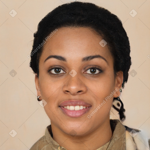 Joyful black young-adult female with short  black hair and brown eyes