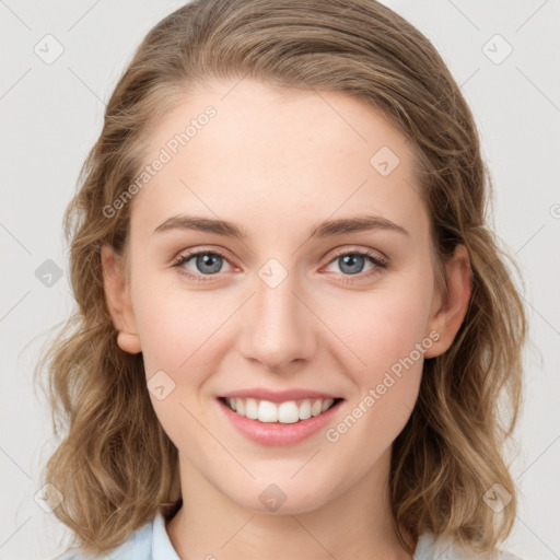 Joyful white young-adult female with medium  brown hair and green eyes