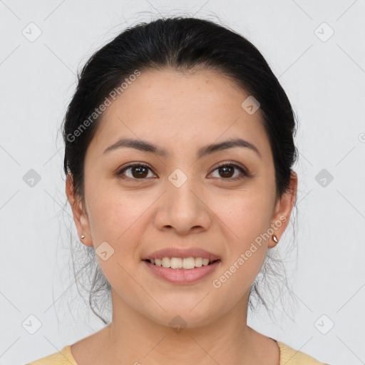 Joyful asian young-adult female with medium  brown hair and brown eyes