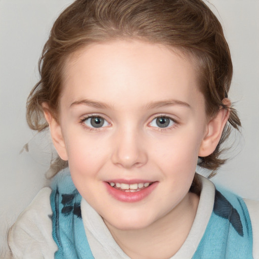 Joyful white child female with medium  brown hair and blue eyes