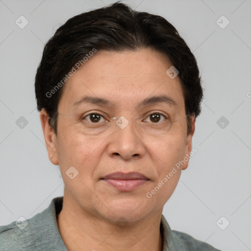 Joyful white adult female with short  brown hair and grey eyes