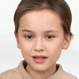 Joyful white child female with short  brown hair and brown eyes