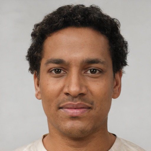 Neutral black young-adult male with short  brown hair and brown eyes