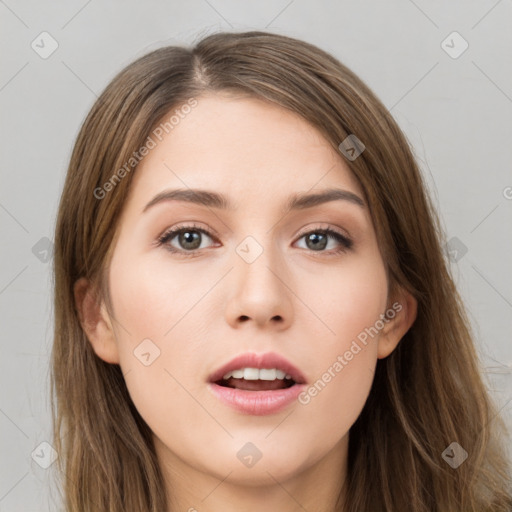 Neutral white young-adult female with long  brown hair and brown eyes